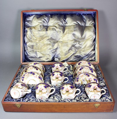 Lot 217 - A Set of Six Royal Crown Derby Coffee Cans and...