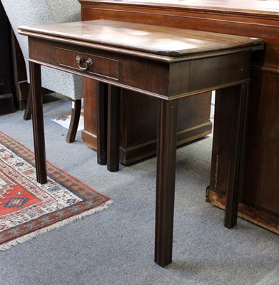 Lot 1301 - A George III Mahogany Fold Over Tea Table, on...