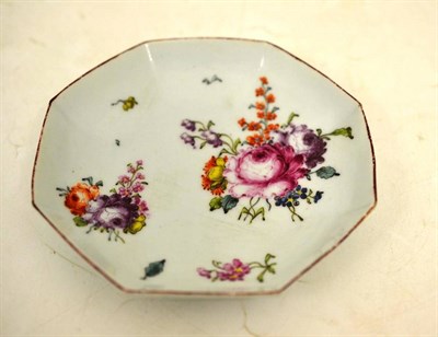 Lot 51 - A Longton Hall Porcelain Octagonal Saucer, circa 1755, painted by the Trembly Rose painter with...