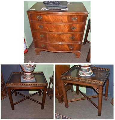 Lot 528 - A pair of mahogany lamp tables with fret carved gallery (a.f.) and a reproduction serpentine chest