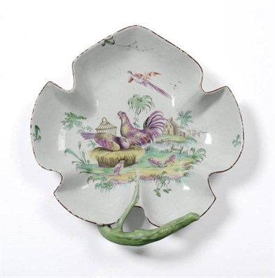 Lot 52 - A Rare Longton Hall Porcelain Leaf Dish, circa 1755, painted in colours with nesting hens and...