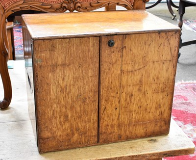 Lot 1138 - An Oak Cigar Chest, fitted with three drawers,...