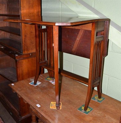 Lot 534 - An Edwardian mahogany Sutherland table