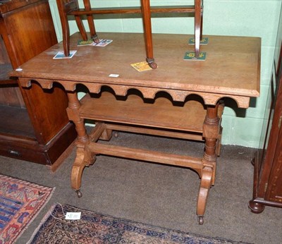 Lot 535 - Late Victorian oak library table