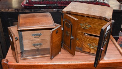 Lot 1148 - An Edwardian Oak Smokers Cabinet, formed as a...