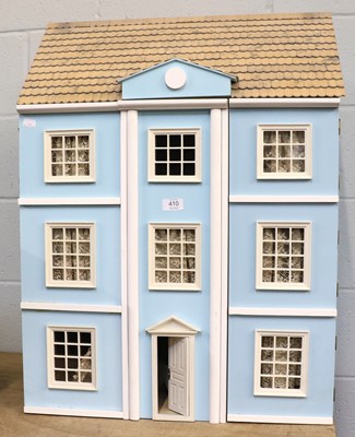 Lot 410 - A Blue Painted Dolls House, three storey with...