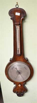 Lot 543 - A rosewood wheel barometer signed Negretti & Zambra