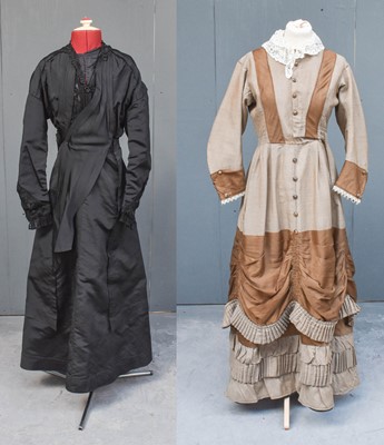 Lot 2015 - A Late 19th Century Brown Dress, with lace...