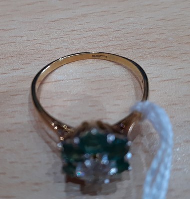 Lot 2101 - An 18 Carat Gold Emerald and Diamond Ring the...