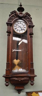 Lot 549 - A Vienna type double weight driven wall clock