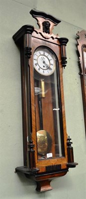 Lot 551 - A Vienna type single weight driven wall clock