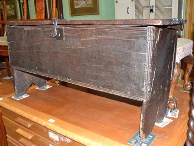 Lot 558 - A 17th century oak six plank coffer