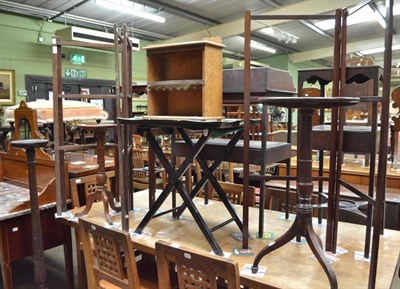 Lot 562 - Two tripod tables, two towel horses, a small oak bookshelf, an ebonised small butler's tray on...