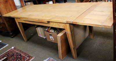 Lot 1227 - A Modern Oak Extending Dining Table, 185cm...