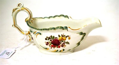 Lot 57 - A Gold Anchor Period Chelsea Porcelain Sauceboat, circa 1760, with scroll moulded handle and border