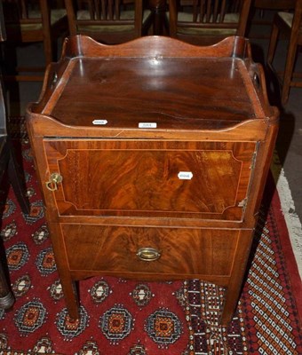 Lot 584 - A George III mahogany night table with shaped galleried top