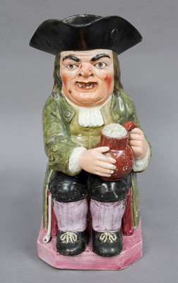 Lot 43 - An Early 19th Century Pearlware Toby Jug,...