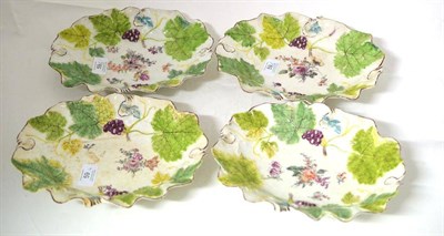 Lot 59 - A Set of Four Chelsea Porcelain Leaf Moulded Dishes, 1758, of shaped oval form, painted with flower