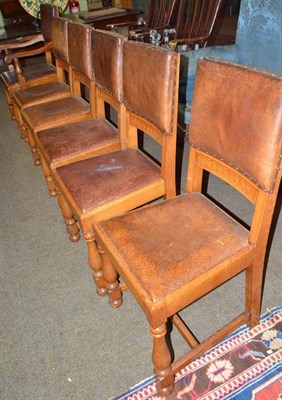 Lot 602 - Set of ten oak dining chairs, with leather upholstery and drop-in seats, labelled Christopher Pratt