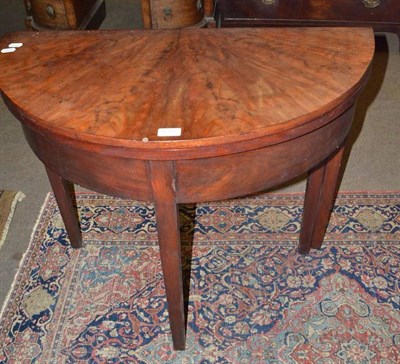 Lot 610 - Mahogany fold over card table