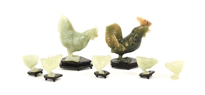 Lot 131 - A Chinese Jade Family of Hens, the...