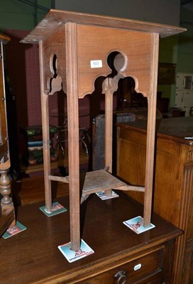 Lot 623 - An Arts & Crafts walnut two tier table