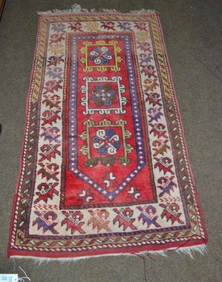 Lot 627 - West Anatolian prayer rug, the strawberry field with five squares beneath the Mihrab enclosed...