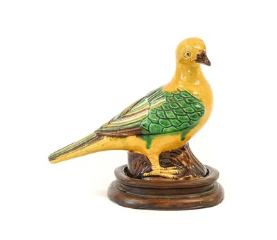 Lot 124 - A Chinese Sancai Glazed Pigeon, in Ming style,...