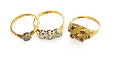 Lot 18 - A 9 Carat Gold Ruby Ring, finger size O; A...