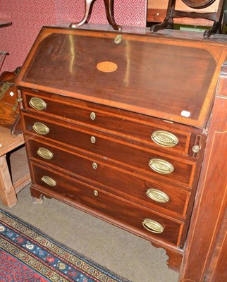 Lot 635 - A 19th century mahogany bureau cross-banded with satinwood