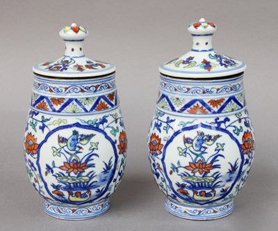 Lot 265 - A Pair of Chinese Doucai Jars and Covers, Ming...