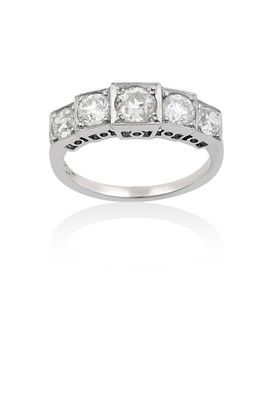 Lot 2031 - A Diamond Five Stone Ring the graduated old...