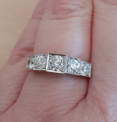 Lot 2031 - A Diamond Five Stone Ring the graduated old...