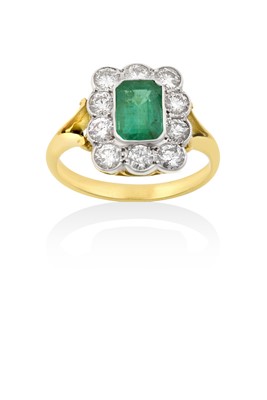 Lot 2058 - An Emerald and Diamond Cluster Ring the...