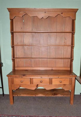 Lot 643 - Large pine dresser with rack