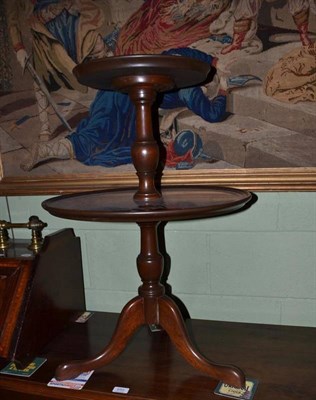 Lot 649 - A mahogany two tier dumb waiter