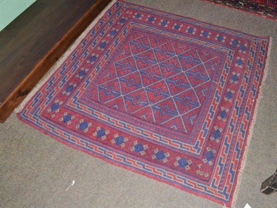 Lot 652 - Balouch rug (piled, flatweave), West Afghanistan, the diamond lattice field enclosed by...