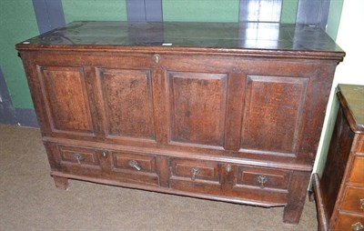 Lot 656 - An 18th century oak chest