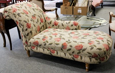 Lot 1295 - A Modern Chaise Longue, upholstered in floral...