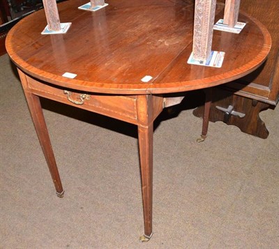 Lot 657 - A mahogany Pembroke table