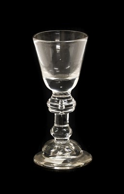Lot 5 - A Wine Glass, circa 1720, the funnel bowl on...