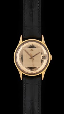 Lot 2269 - Movado: An 18 Carat Gold Automatic Calendar...