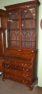 Lot 663 - Glazed bureau bookcase (three pieces) with two keys