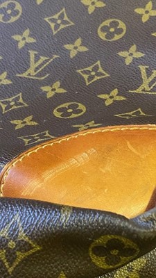 Sold at Auction: Louis Vuitton Sirius 70 Monogram Suitcase
