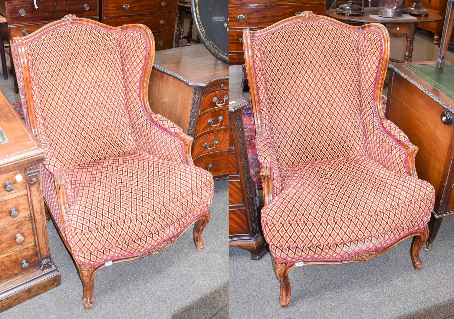 Lot 1160 - A Pair of French Wingback Armchairs,...