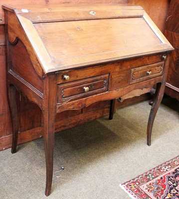 Lot 1219 - A French Walnut Bureau, circa 1900, raised on...