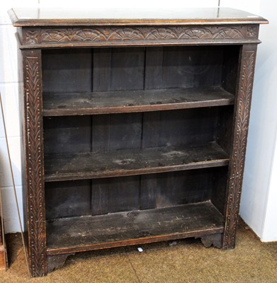 Lot 1197 - A Carved Oak Open Bookcase, circa 1900, with...