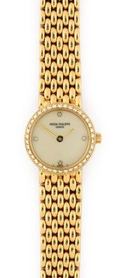 Lot 2256 - Patek Philippe: A Lady's 18 Carat Gold Diamond...