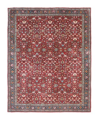 Lot 637 - Indian Carpet, circa 1950 The claret field...