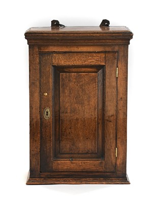 Lot 666 - A George III Wall-Mounted Oak Cabinet, late...